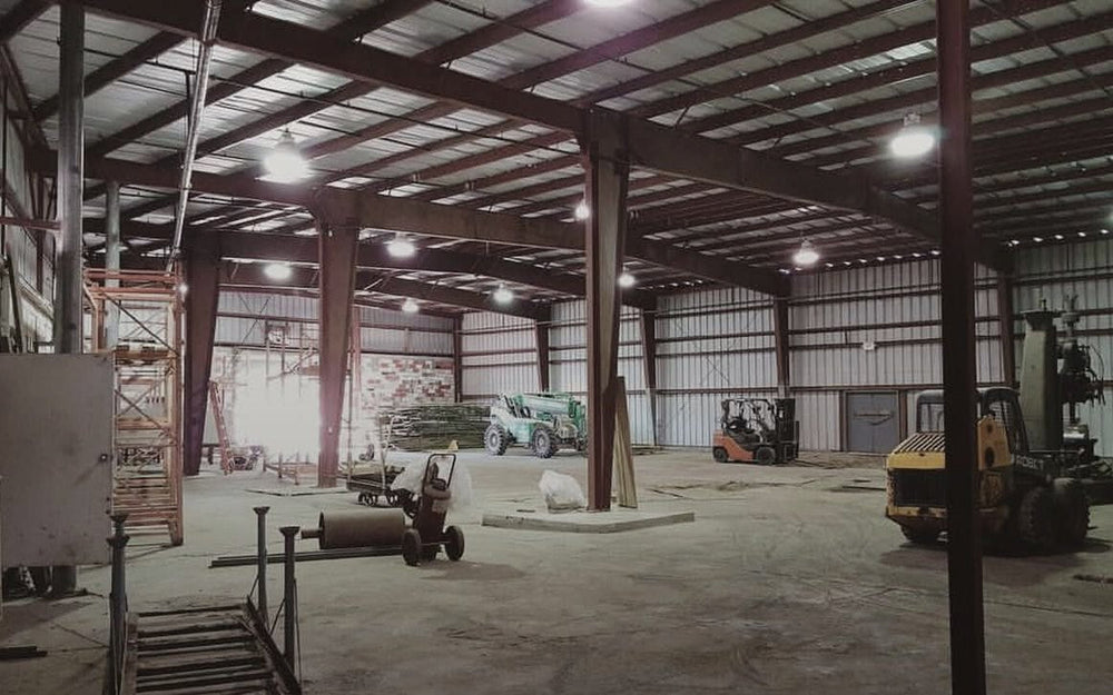 The empty Smoke Cartel warehouse, forklifts parked, before the move