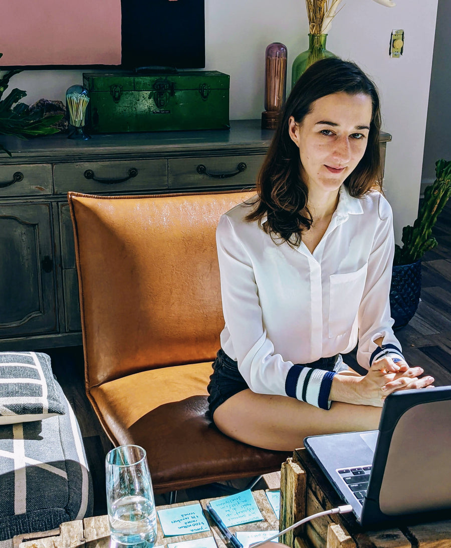 Darby Cox working at her laptop